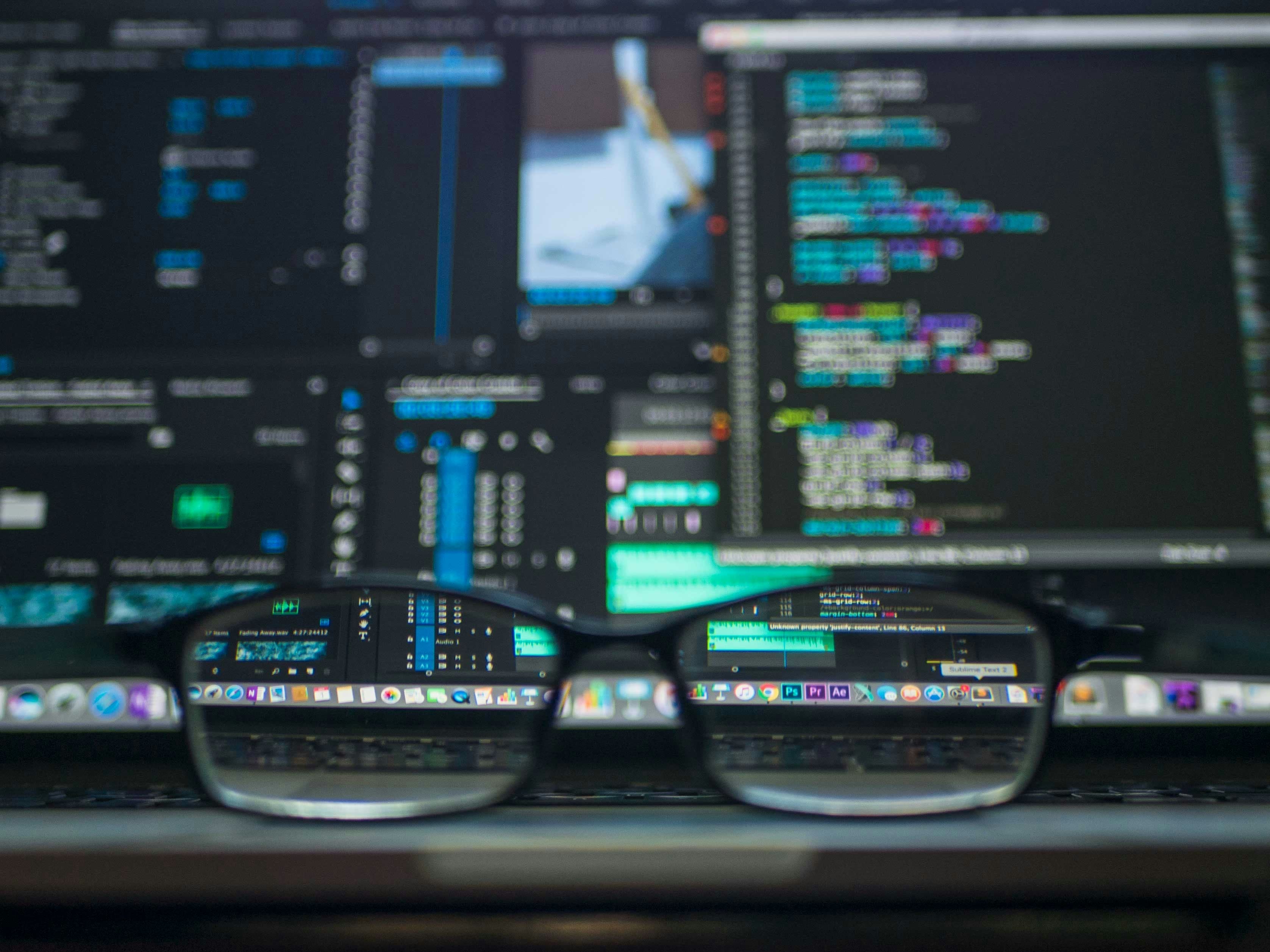 Code on a monitor under cool studio lighting